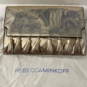 Gold clutch with tassels